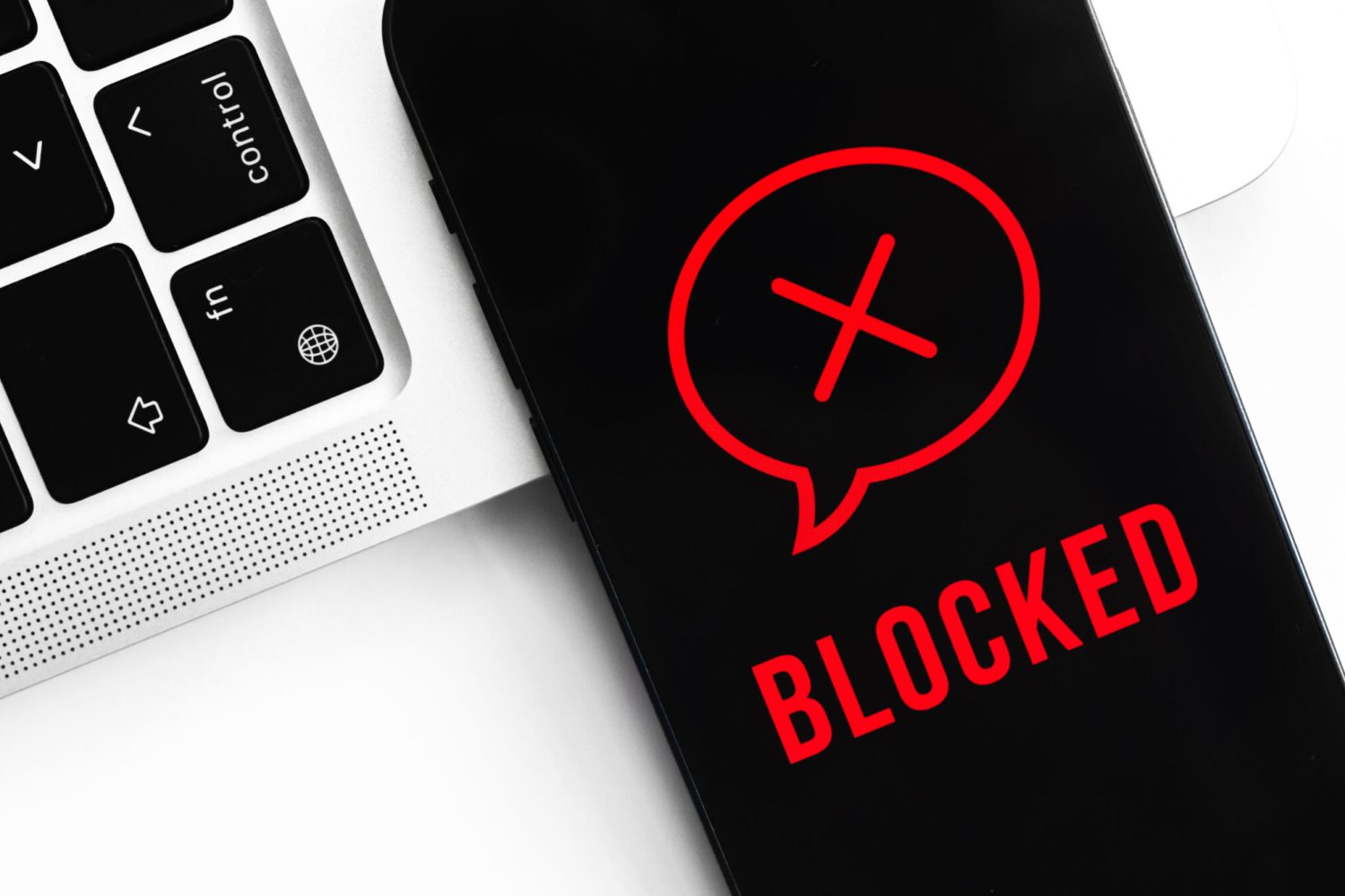 blocked-messages-concept-mobile-phone-privacy-background-black-screen-with-icon-text-modern-technologies-scaled-1.jpg