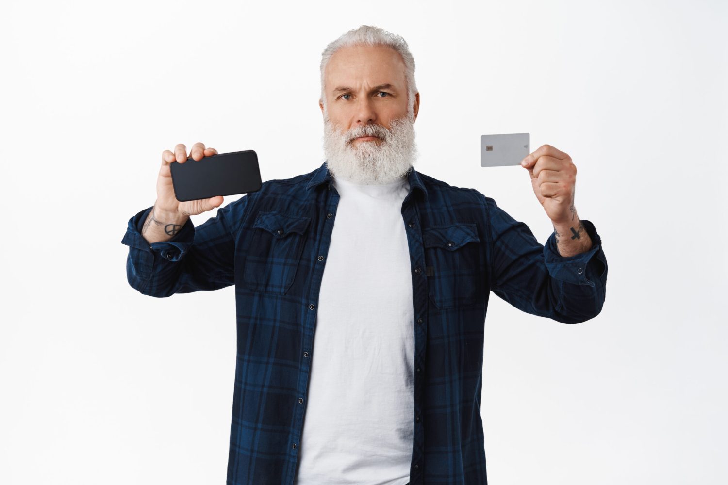 serious-mature-bearded-man-showing-mobile-phone-screen-credit-card-showing-something-smartphone-display-standing-white-background-copy-space-scaled-1.jpg